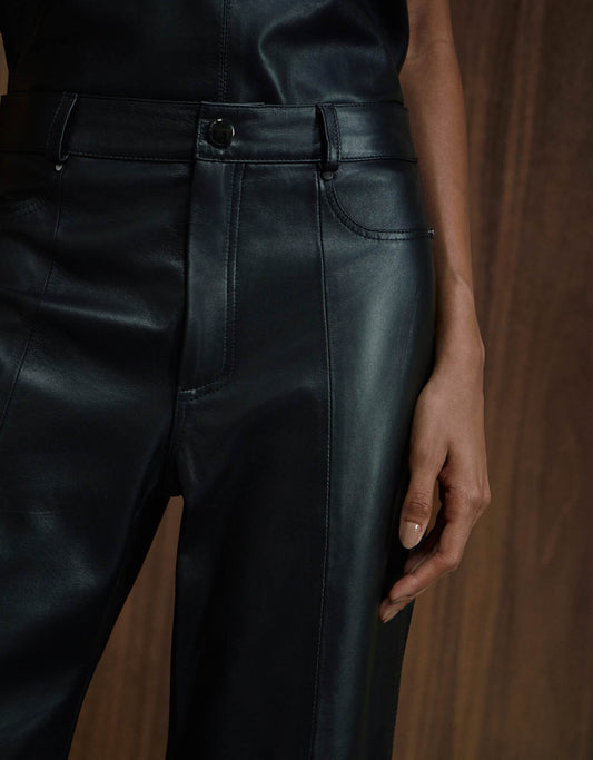 CALÇA TEREZA MADRE REINA MALHA COM COURO PRETO